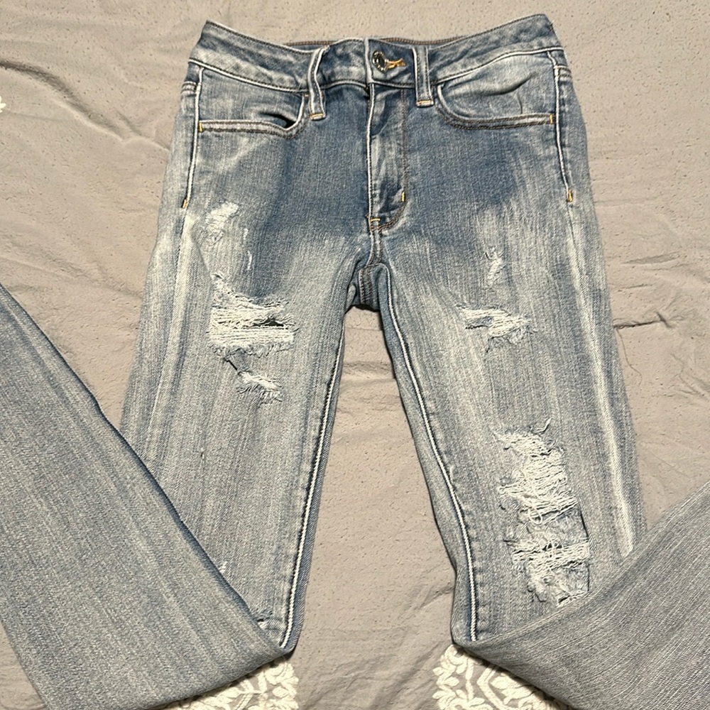 American Eagle Size 4 Super Skinny Distressed Jeans
